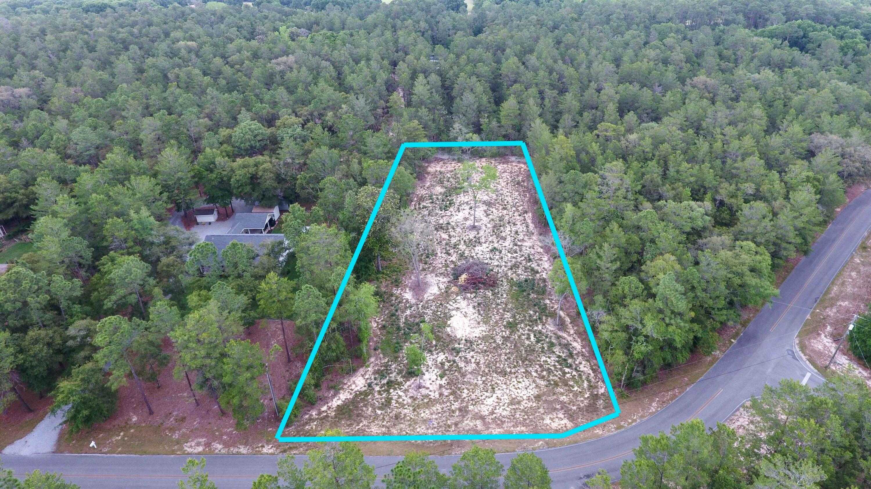 photo 1: Lot 7 Via Internacional, DeFuniak Springs FL 32435