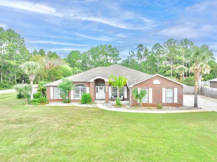 photo 1: 7284 Rexford Street, Navarre FL 32566