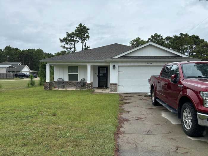 photo 1: 9044 Quail Roost Drive, Navarre FL 32566