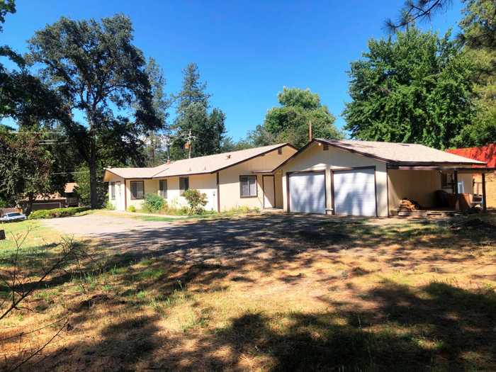 photo 1: 48914 Royal Oaks Drive, Oakhurst CA 93644