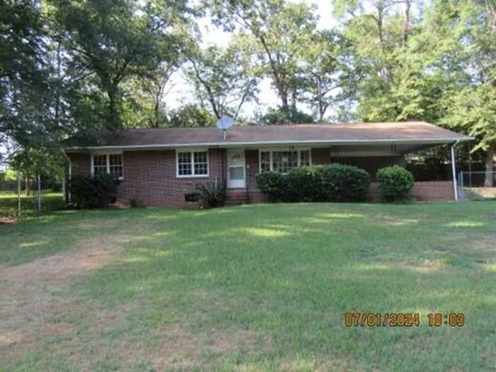 photo 1: 408 N THOMPSON Street, Wrens GA 30833