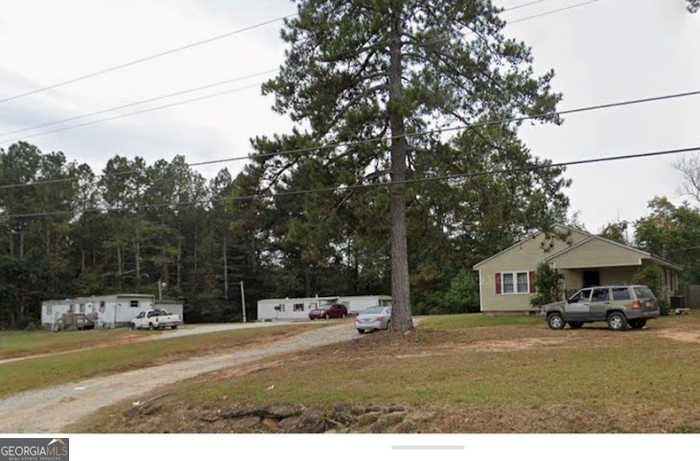 photo 1: 2058 Four Notch Road, Carrollton GA 30116