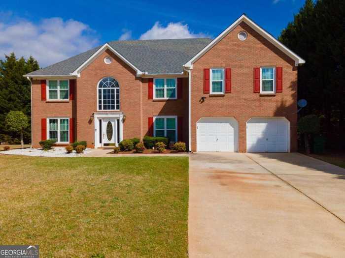 photo 1: 6844 CAVALIER Court, Stone Mountain GA 30087