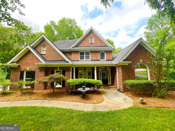 photo 1: 2055 Woods River Lane, Duluth GA 30097