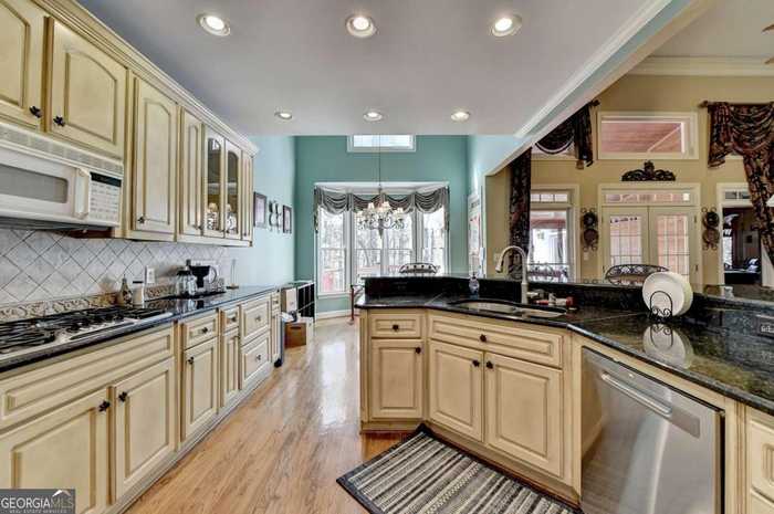 photo 2: 2055 Woods River Lane, Duluth GA 30097