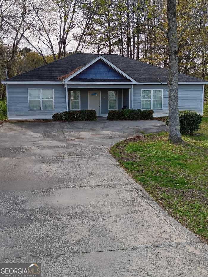 photo 1: 10945 City Pond Road, Oxford GA 30054