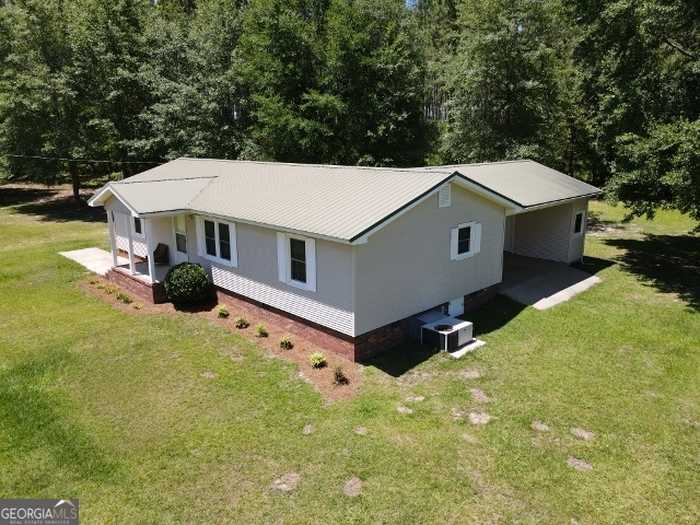 photo 1: 1324 Wes Lawson Road, Kite GA 31049