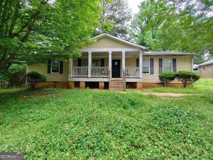 photo 1: 383 Third Avenue, Scottdale GA 30079