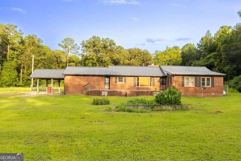 photo 1: 4880 Dixon Road, Lizella GA 31052