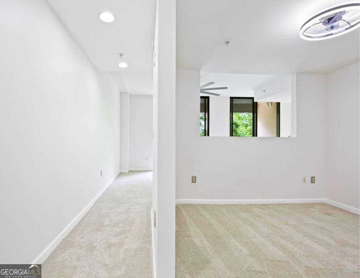 photo 2: 3040 Peachtree Road NW Unit 305, Atlanta GA 30305