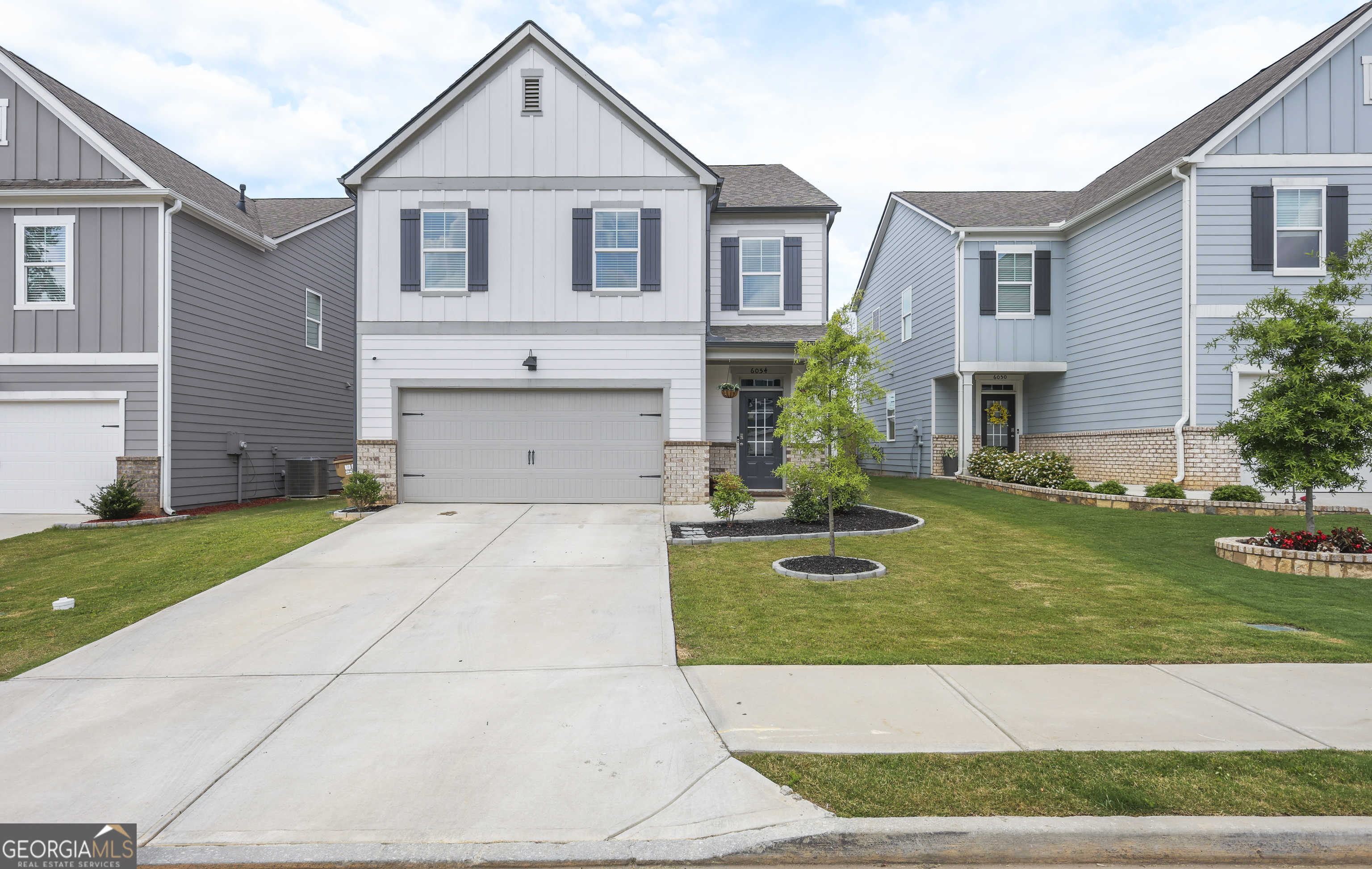 photo 1: 6054 Hoot Owl Lane, Flowery Branch GA 30542