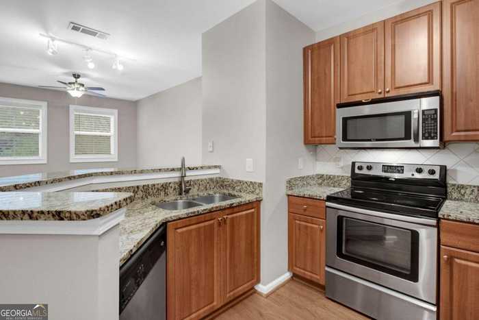 photo 2: 10 Perimeter Summit Boulevard NE Unit 4225, Atlanta GA 30319