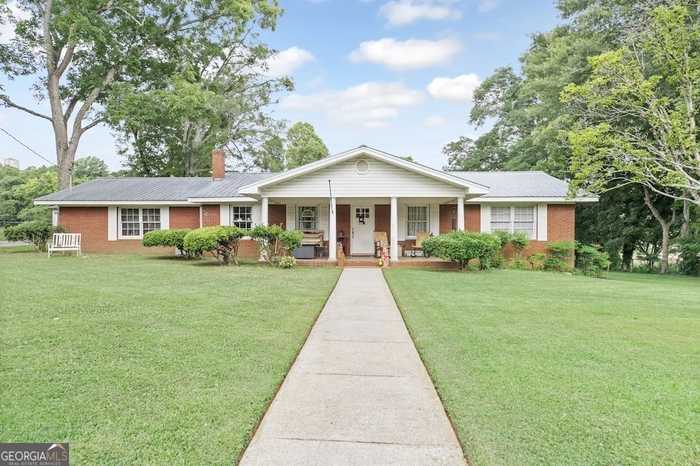 photo 1: 308 Carrollton St, Buchanan GA 30113