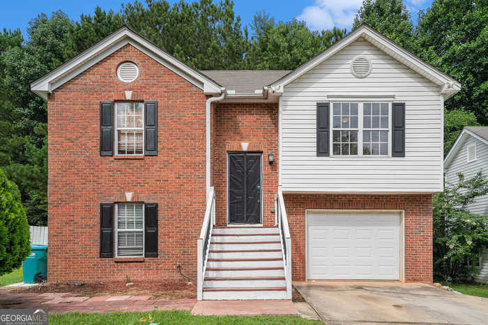 photo 1: 2104 OAKLAND SPRING Drive, Snellville GA 30039