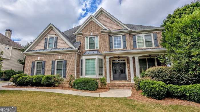 photo 1: 7708 Sleepy Lagoon Way, Flowery Branch GA 30542