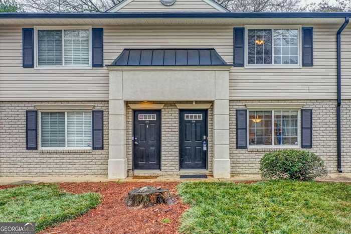 photo 1: 6940 ROSWELL Road Unit 11D, Atlanta GA 30328