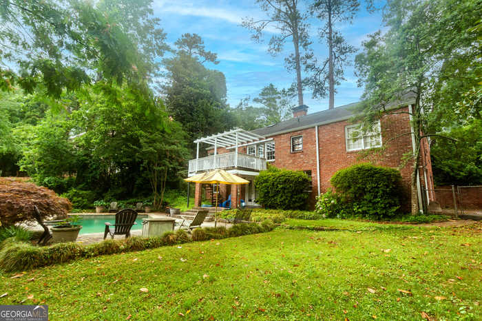 photo 1: 3868 Ivy Road NE, Atlanta GA 30342