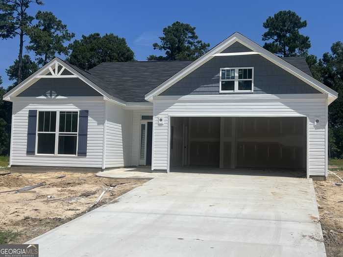 photo 1: 140 Foxridge Ct Unit LOT 5, Metter GA 30439