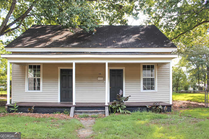 photo 1: 118 Avenue F, Thomaston GA 30286