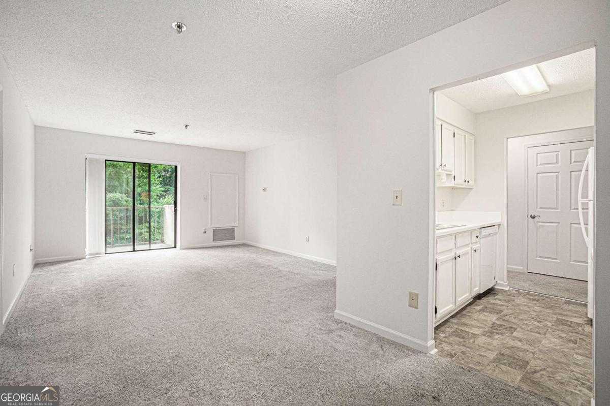 photo 1: 300 Johnson Ferry Road NE Unit A203, Sandy Springs GA 30328