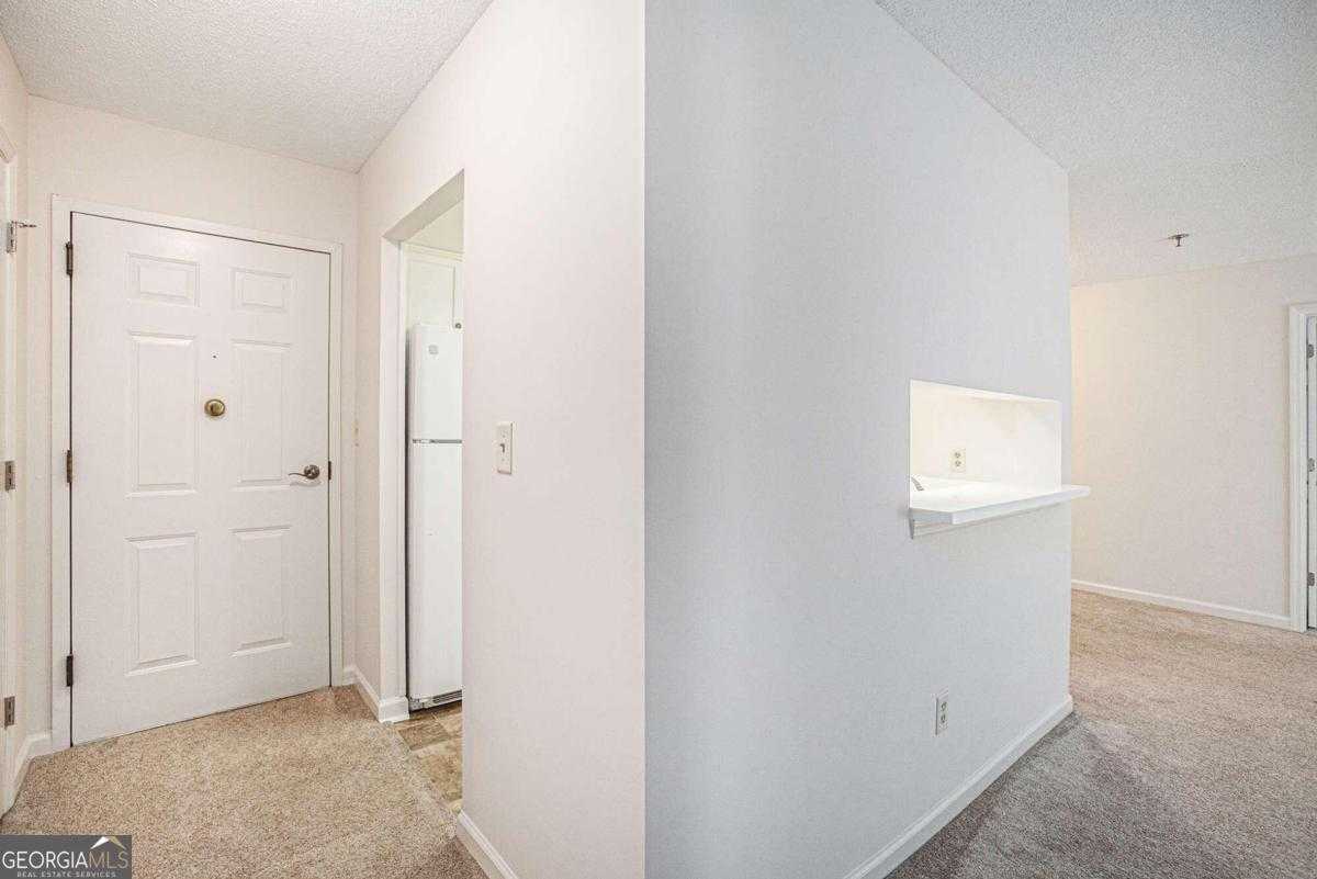 photo 3: 300 Johnson Ferry Road NE Unit A203, Sandy Springs GA 30328