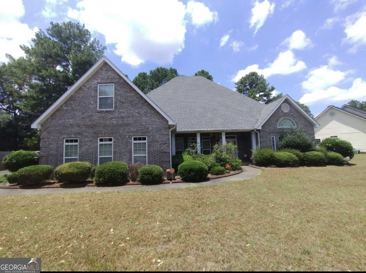 photo 1: 302 Yorktown Drive, Perry GA 31069