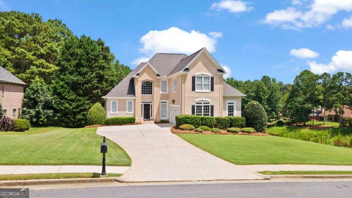 photo 1: 6450 Sterling Drive, Suwanee GA 30024