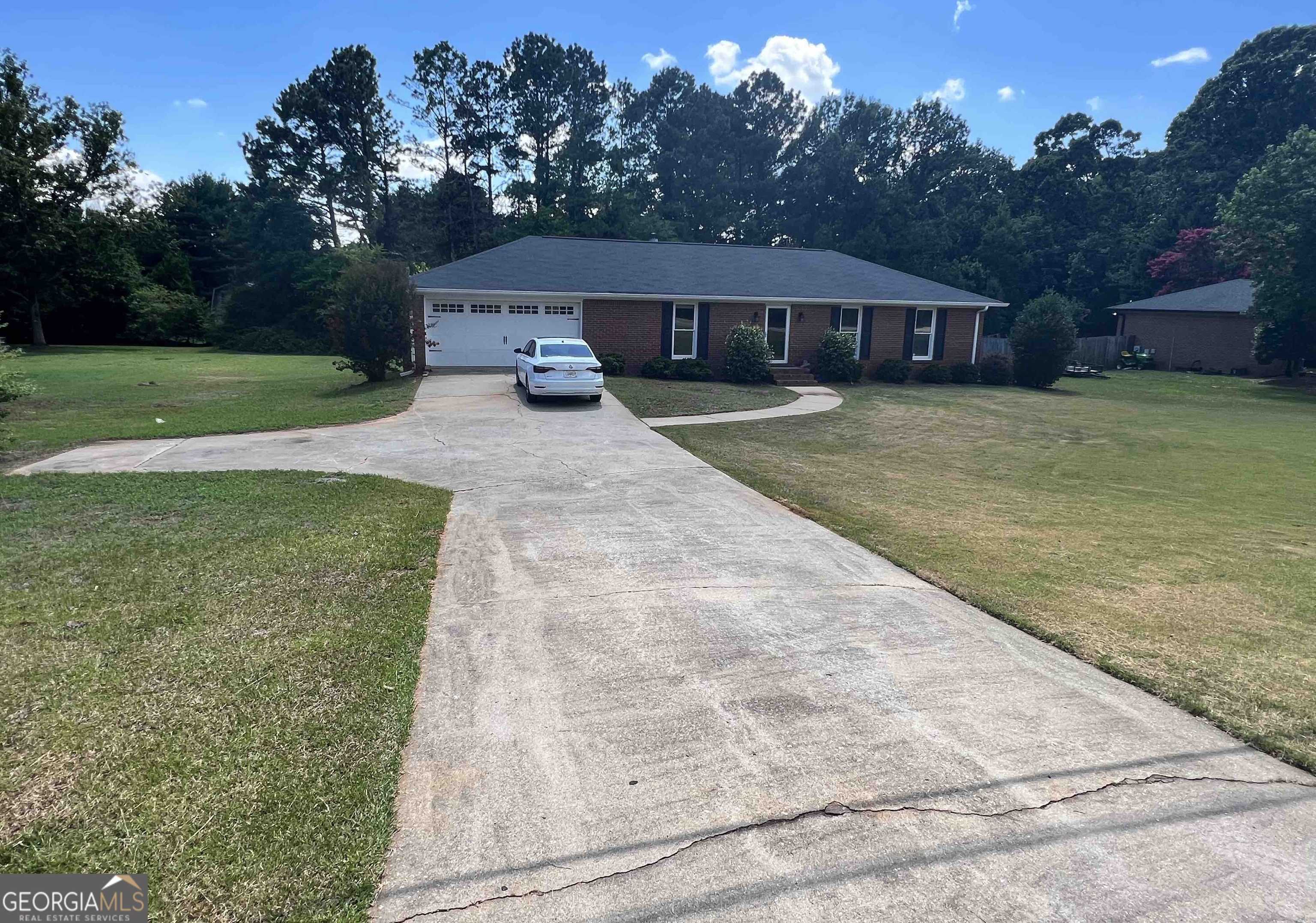 photo 1: 1051 Jimmy Daniel Road, Watkinsville GA 30677