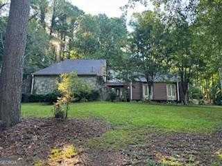 photo 1: 8374 Carlton Road, Riverdale GA 30296