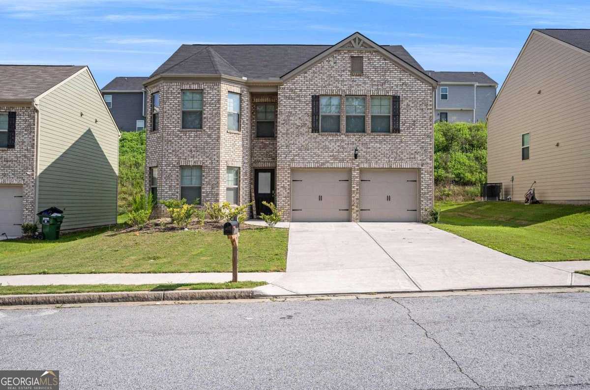 photo 1: 6505 Beaver Creek Trail, Atlanta GA 30349