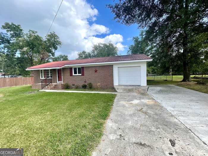 photo 1: 511 Thomas Street, Montezuma GA 31063