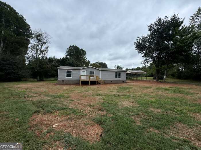 photo 1: 8441 Belton Bridge Road, Lula GA 30554