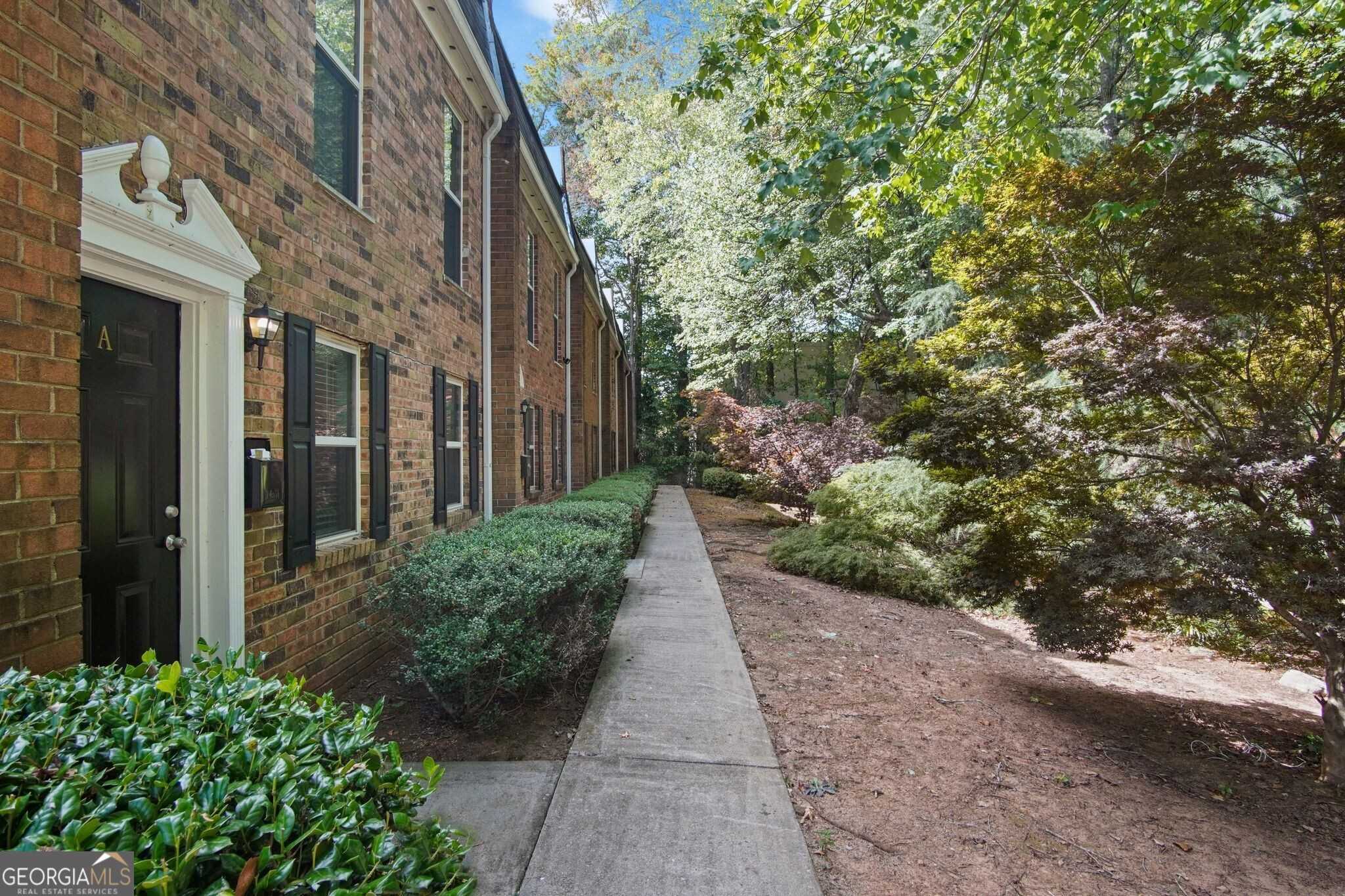 photo 1: 115 N River Drive Unit A, Atlanta GA 30350