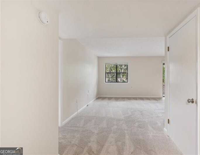 photo 3: 475 Mount Vernon Highway NE Unit C220, Atlanta GA 30328