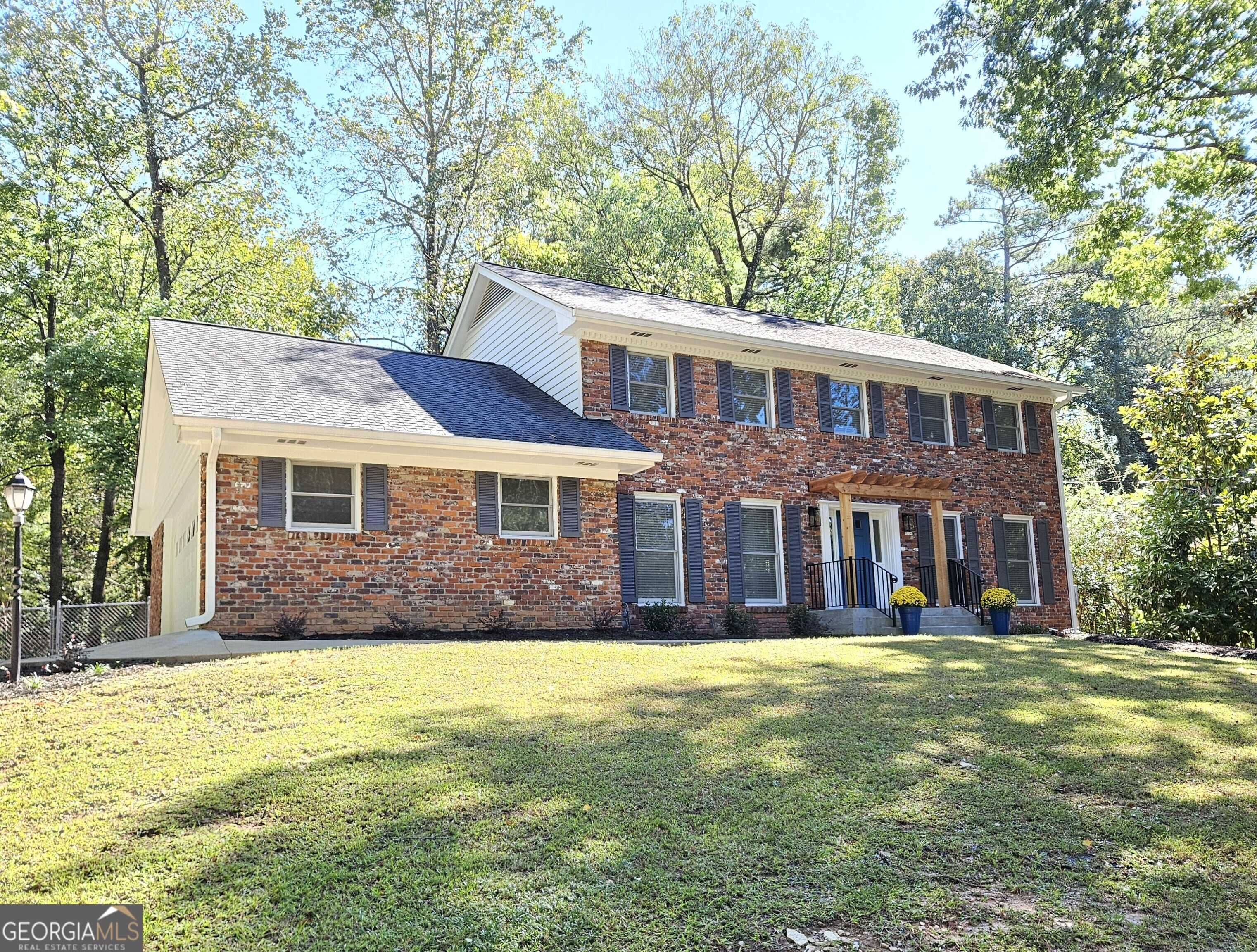 photo 1: 1499 Kings Down Circle, Atlanta GA 30338