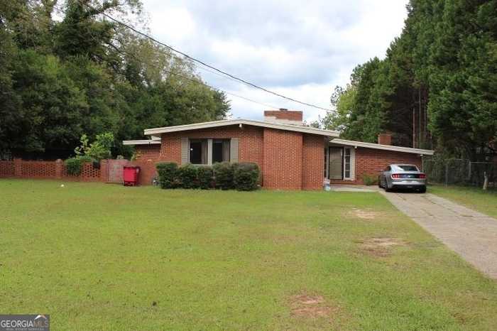 photo 1: 721 E Mccarty Street, Sandersville GA 31082