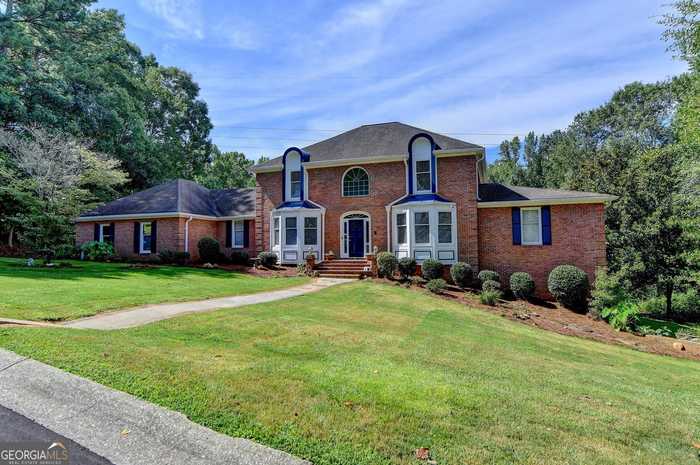 photo 1: 1102 Timber Glen Court, Lilburn GA 30047