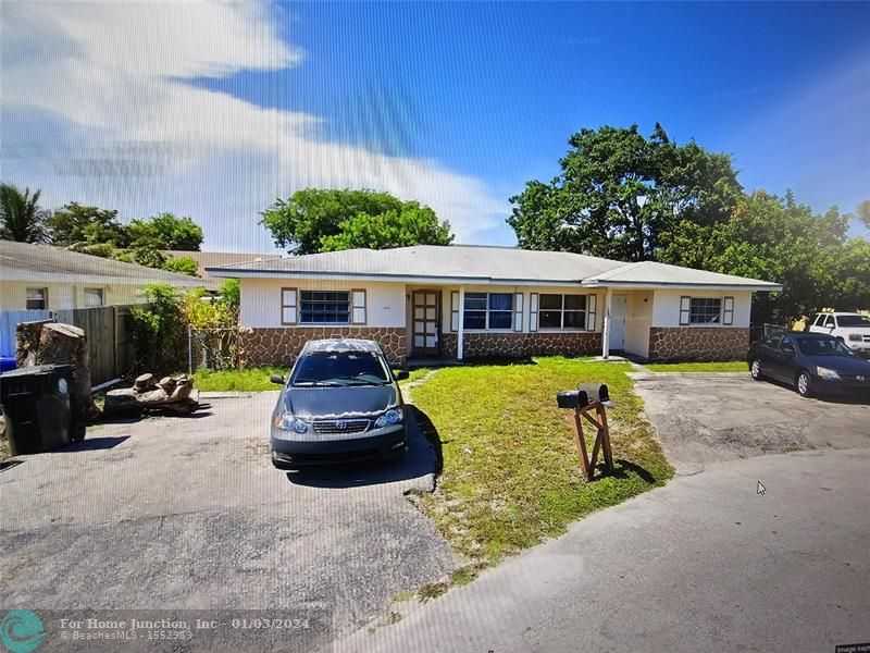 photo 1: 1441 NW 21st St, Fort Lauderdale FL 33311