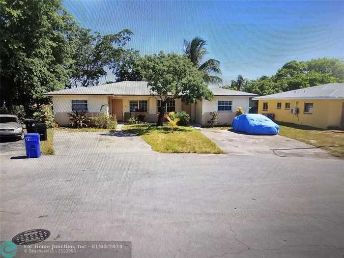 photo 1: 1440 NW 20th Ct, Fort Lauderdale FL 33311