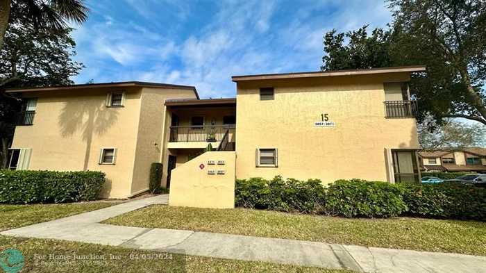 photo 1: 3865 Cocoplum Cir Unit 3865, Coconut Creek FL 33063