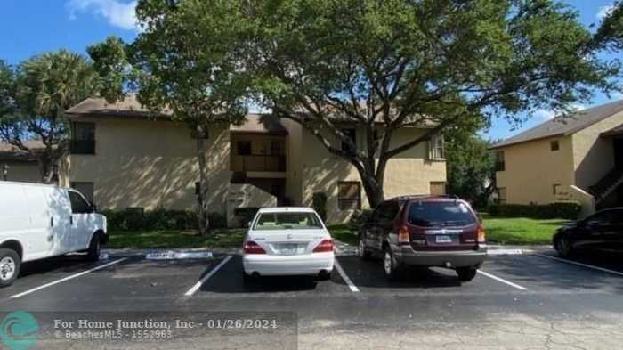 photo 1: 3697 Cocoplum Cir Unit 3697, Coconut Creek FL 33063