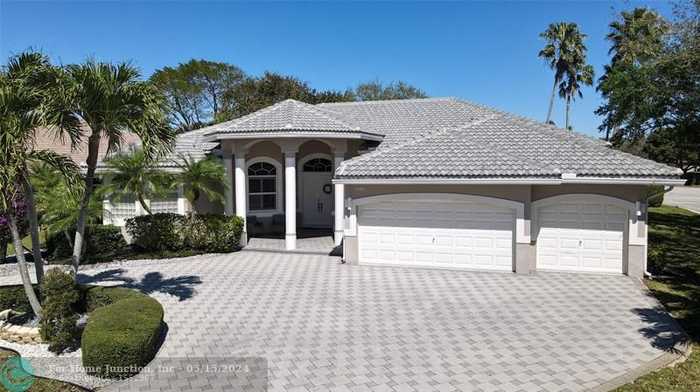 photo 1: 11205 NW 49th St, Coral Springs FL 33076