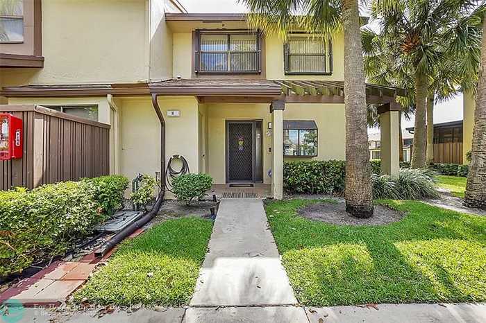 photo 1: 3964 Cocoplum Cir 3688 Unit H, Coconut Creek FL 33063