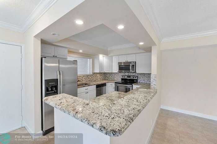 photo 1: 195 Deer Creek Blvd Unit 803, Deerfield Beach FL 33442