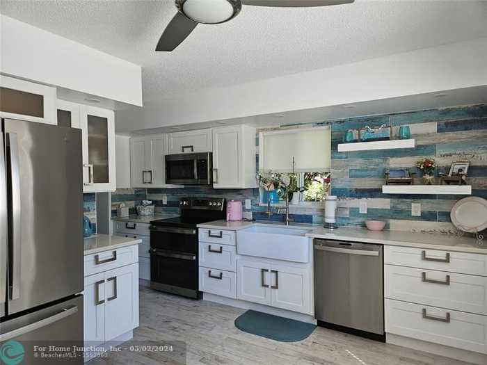 photo 1: 1705 Andros Isle Unit O3, Coconut Creek FL 33066