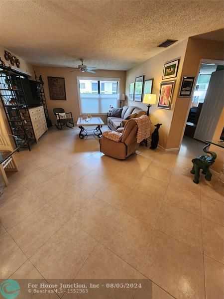 photo 1: 3277 Cocoplum Cir Unit 3327, Coconut Creek FL 33063