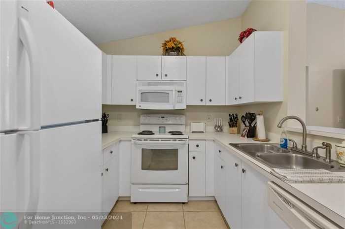 photo 1: 5530 NW 61st St Unit 326, Coconut Creek FL 33073