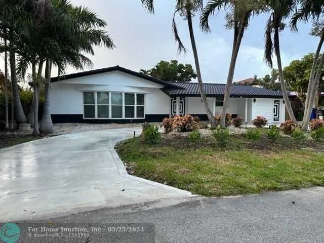 photo 1: 1485 NE 57th Ct, Fort Lauderdale FL 33334