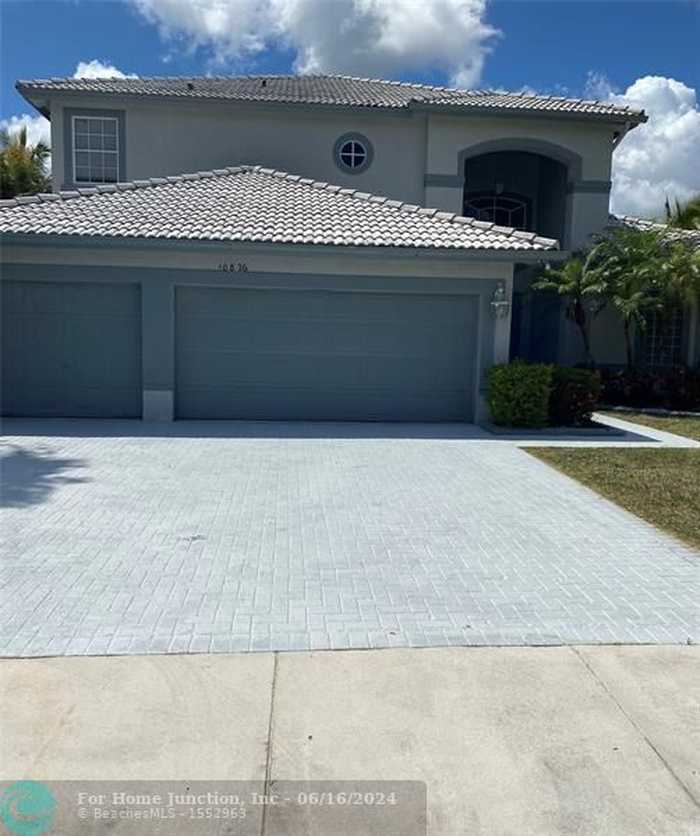 photo 1: 10826 NW 56th Ct, Coral Springs FL 33076