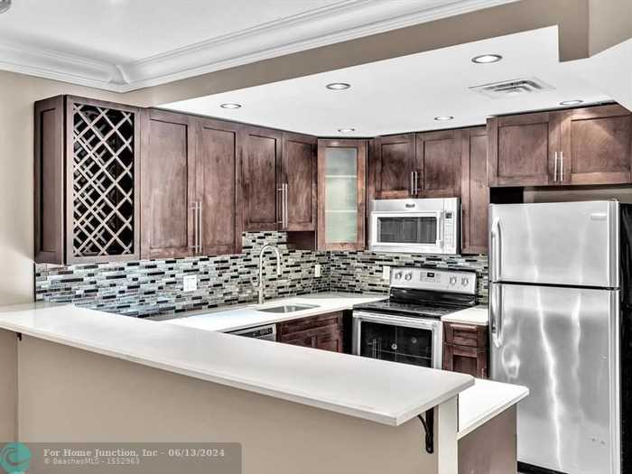 photo 2: 101 E McNab Rd Unit 411, Pompano Beach FL 33060